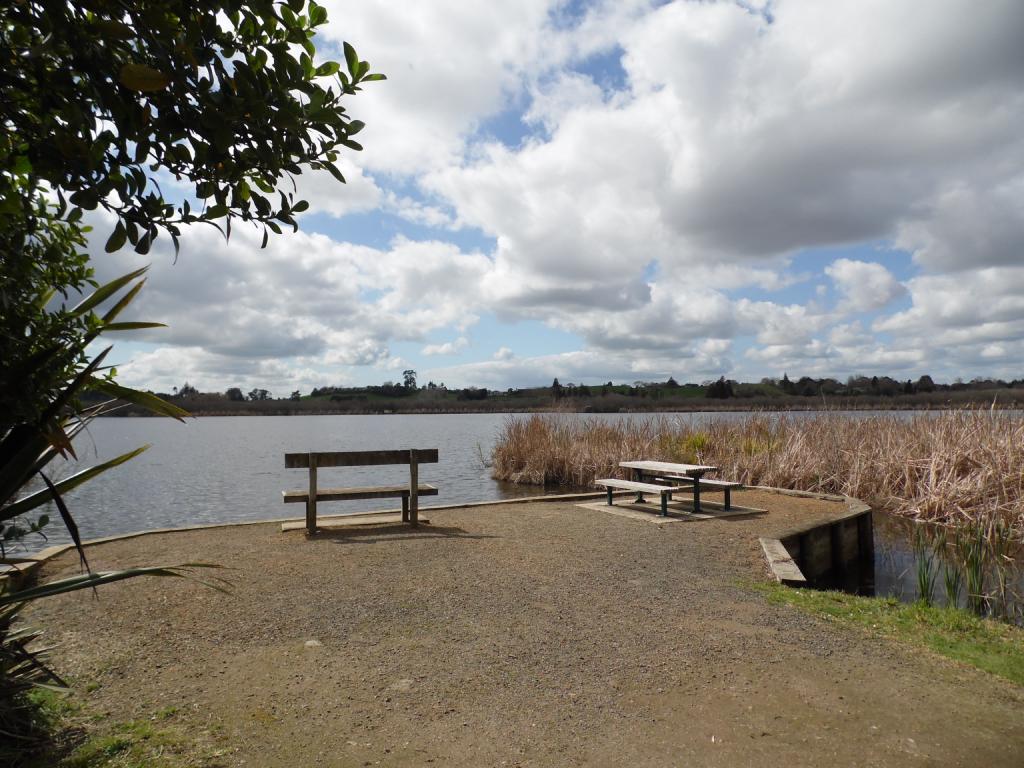 The lake shore was nearby. It has a sturdy bench and table for picnicing.